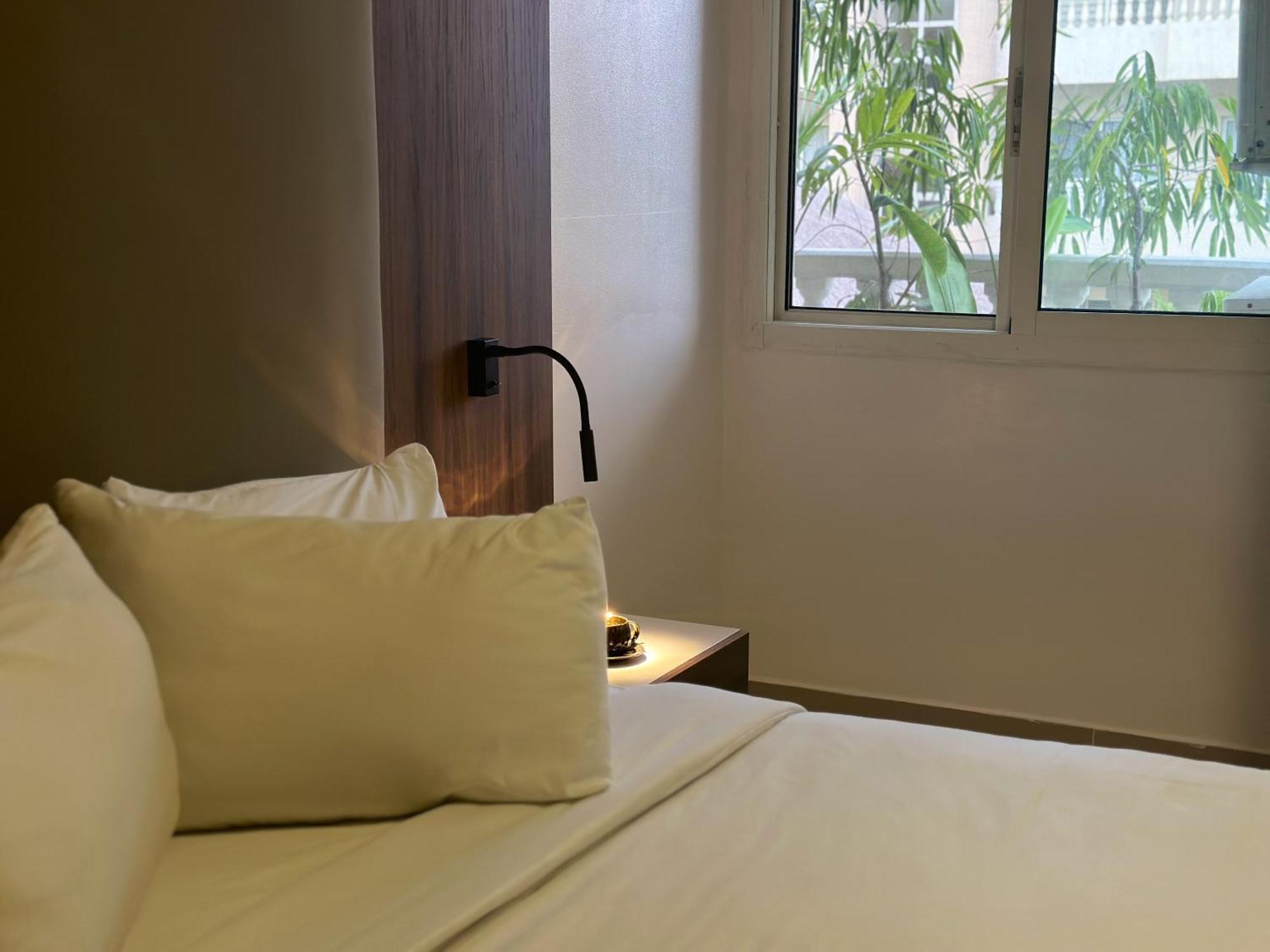 Guided Hospitality - Luxury Accommodations Lagos Bagian luar foto